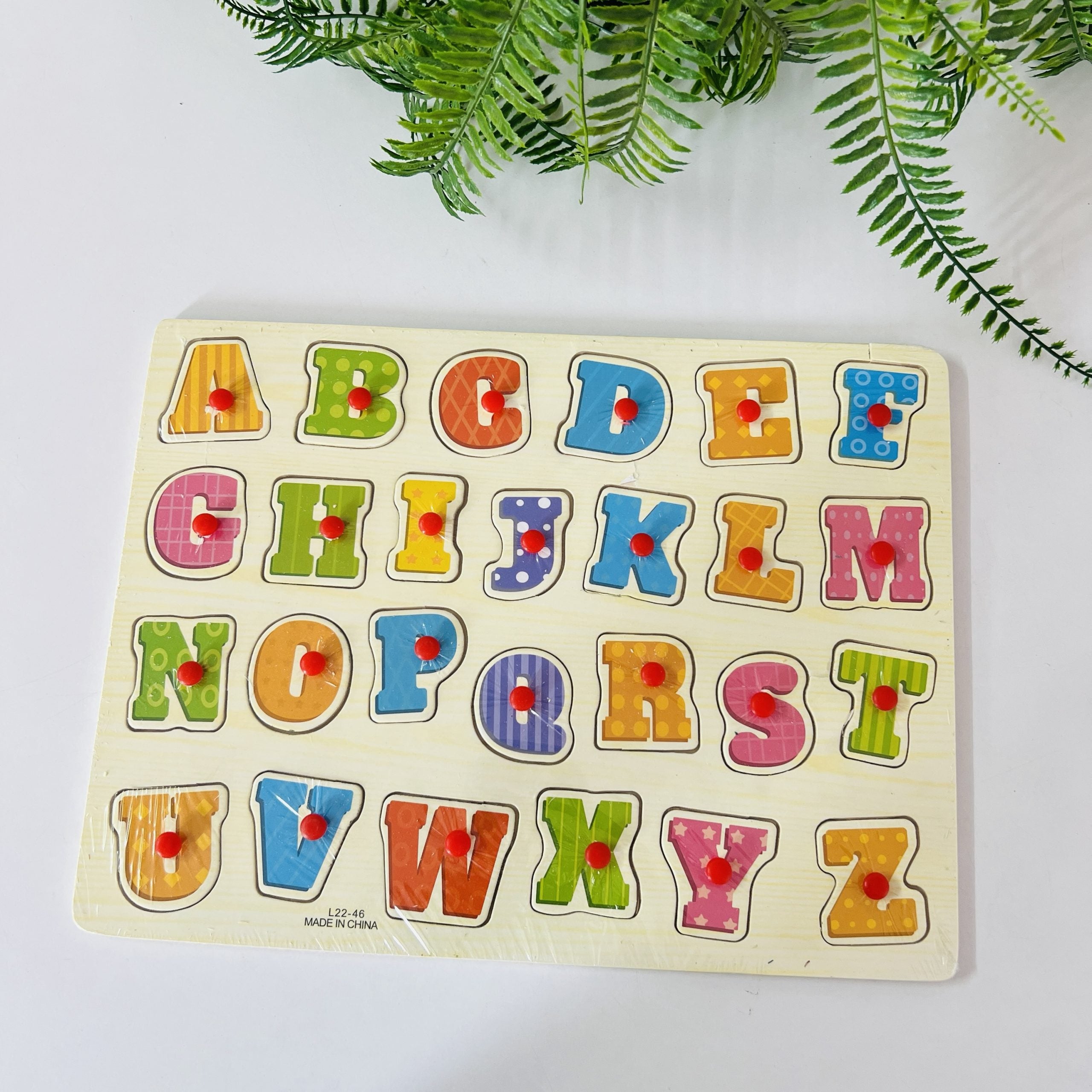 Alphabet knob board