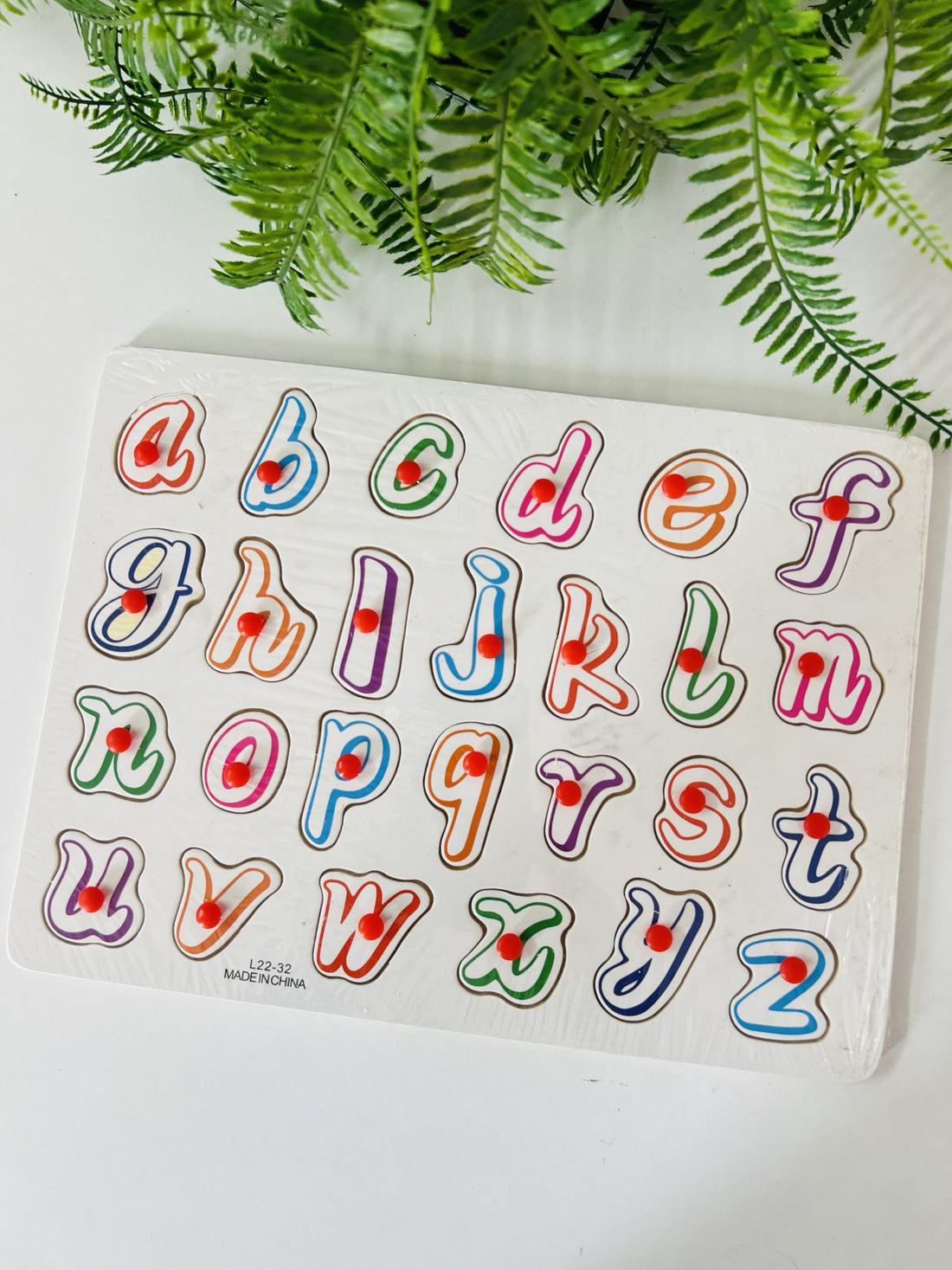 Lower case alphabet knob board